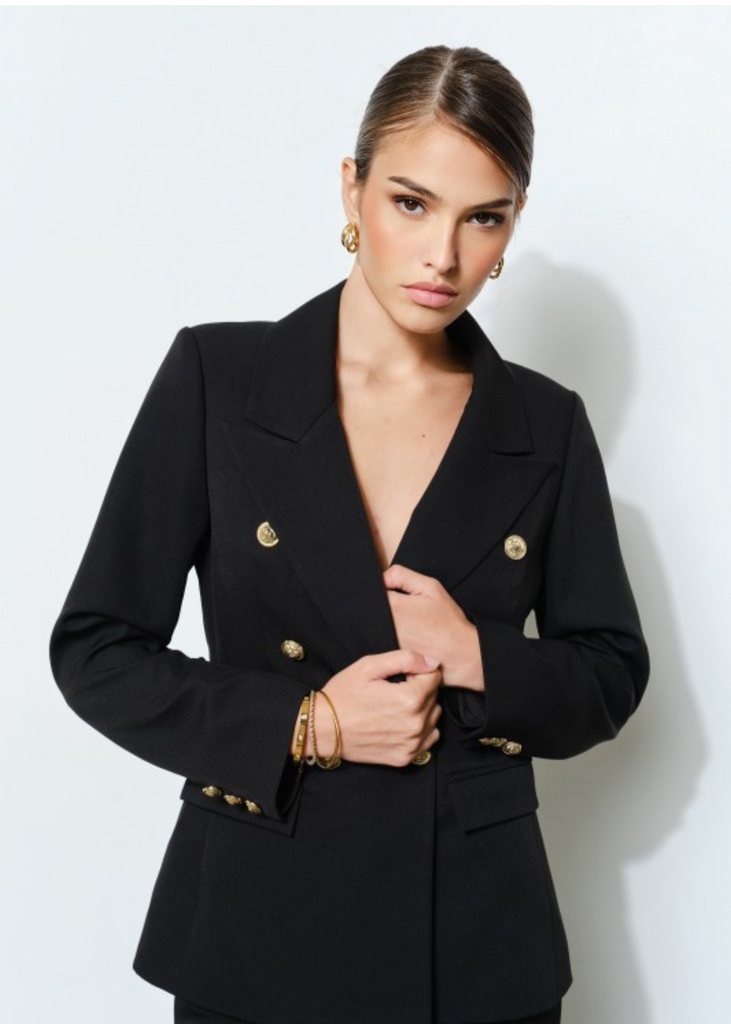 Side view of black gold button blazer highlighting sharp tailoring and feminine silhouette – Elegance By Marislay