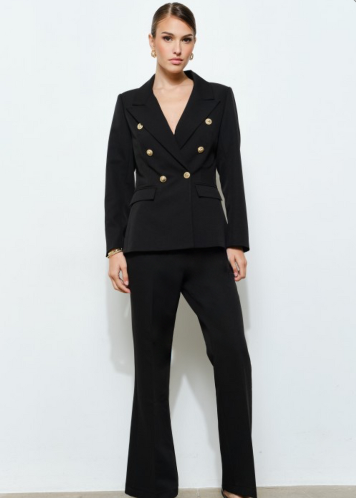 Close-up of black double-breasted blazer with gold button details, styled for executive elegance – Elegance By Marislay