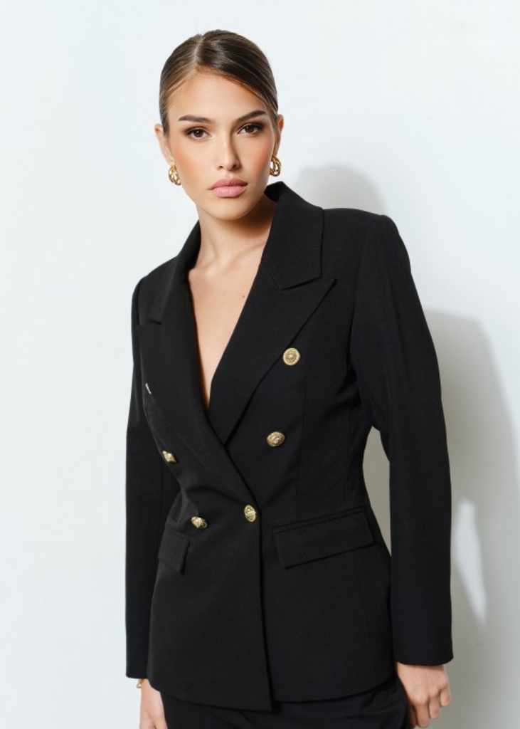  Back view of black blazer and trousers set with gold button accents, tailored for modern business style – Elegance By Marislay