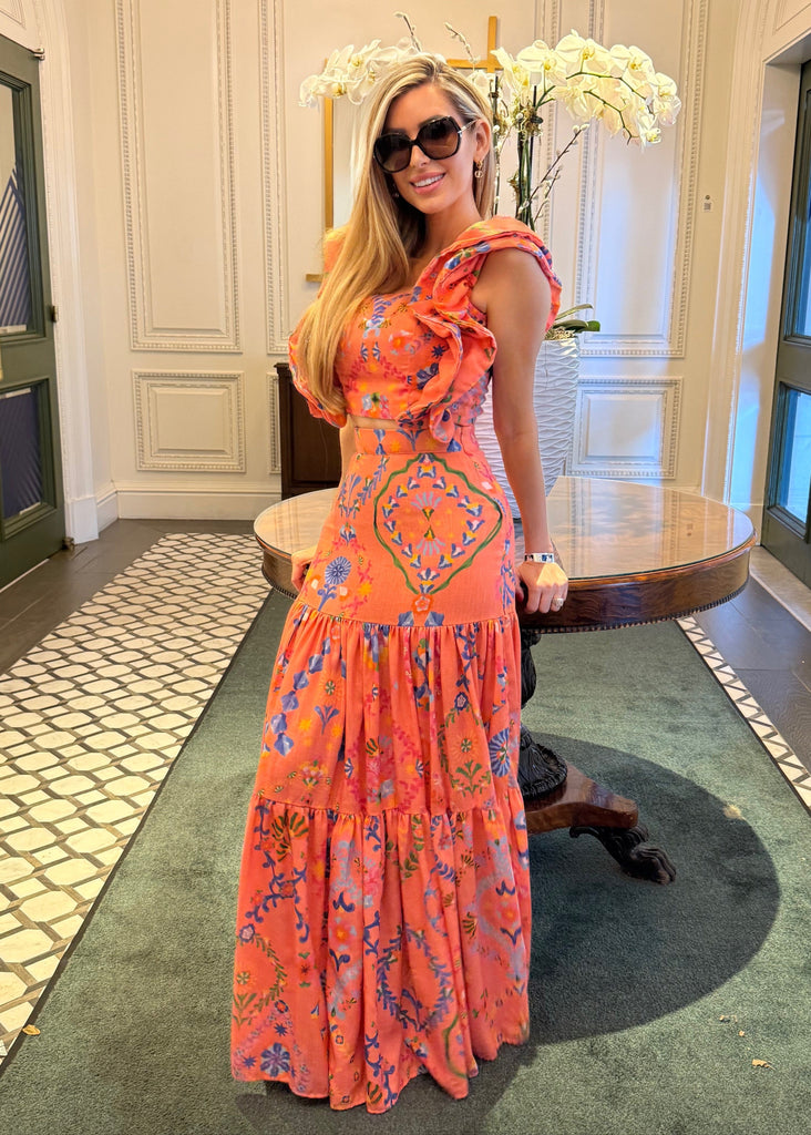 An orange and blue patterned skirt set 