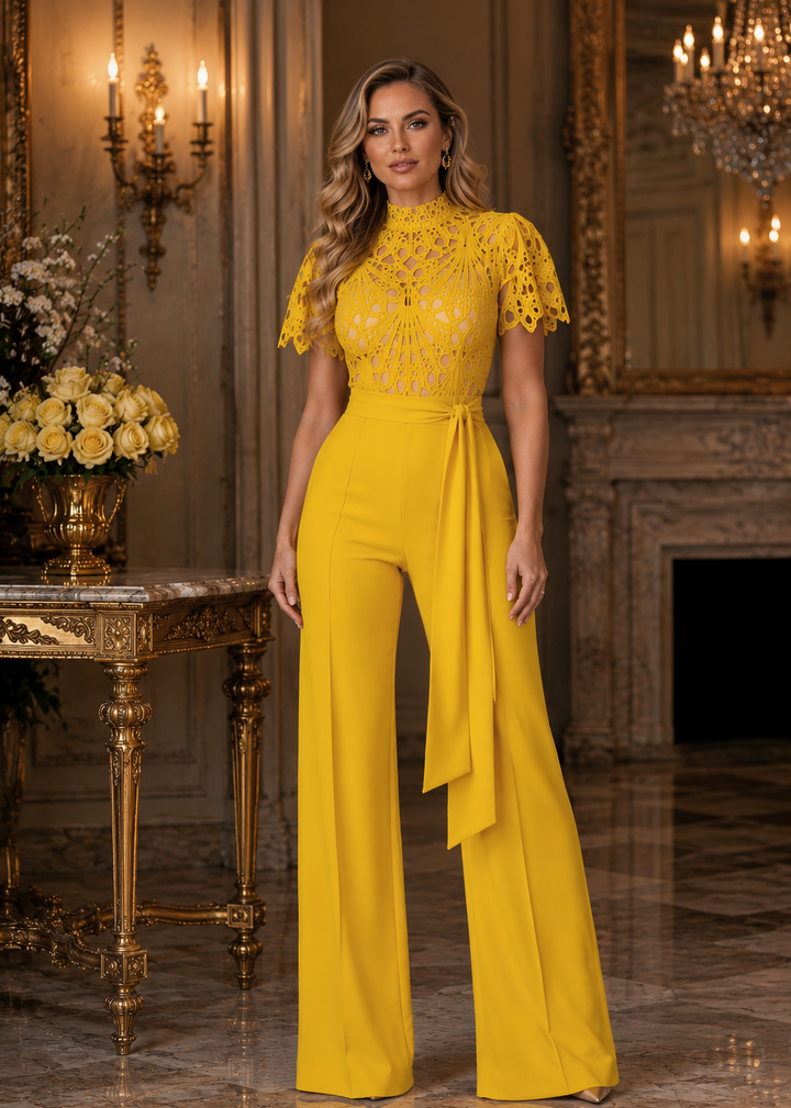 Elegant woman wearing the Janet Yellow Lace High-Neck Wide-Leg Jumpsuit in a luxury editorial setting, featuring intricate lace detailing and sophisticated occasion wear styling.