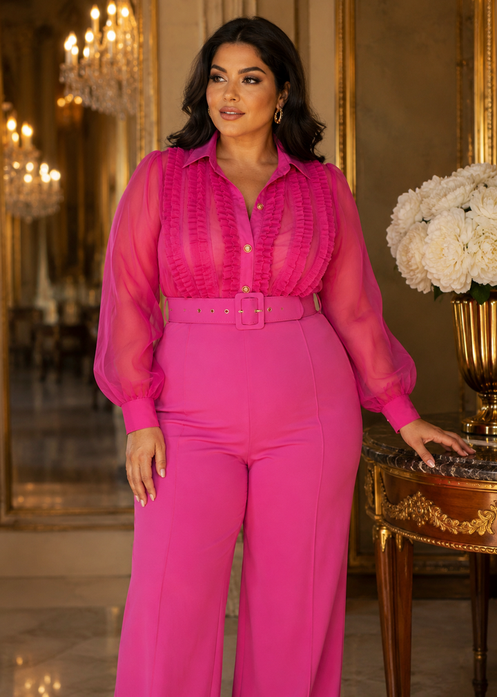 Elegant pink organza jumpsuit for weddings, cocktail parties and special occasions styled in a luxurious editorial setting.