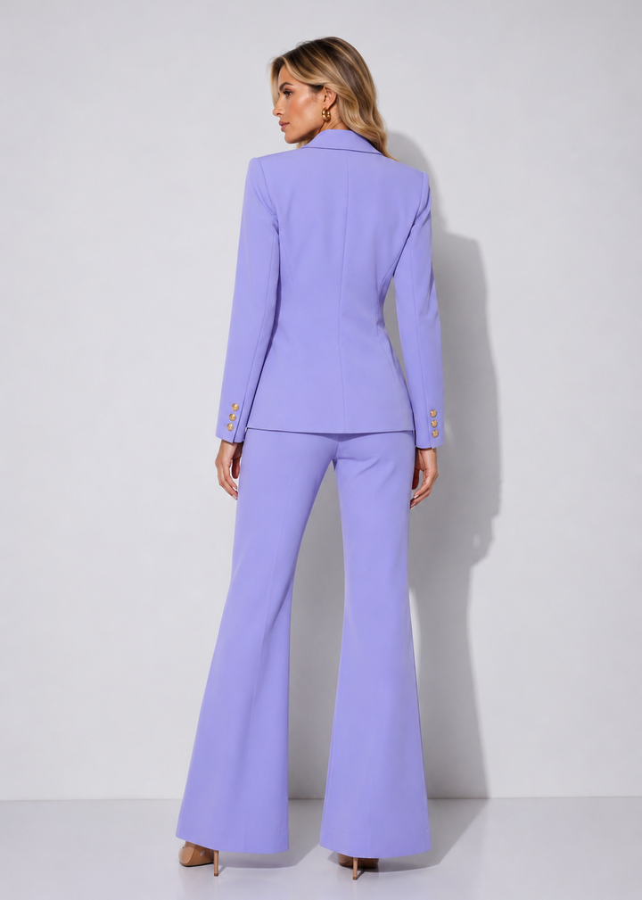 Luxury lavender women’s pantsuit with a double-breasted blazer and wide-leg trousers styled for business meetings, events, and elevated everyday wear.