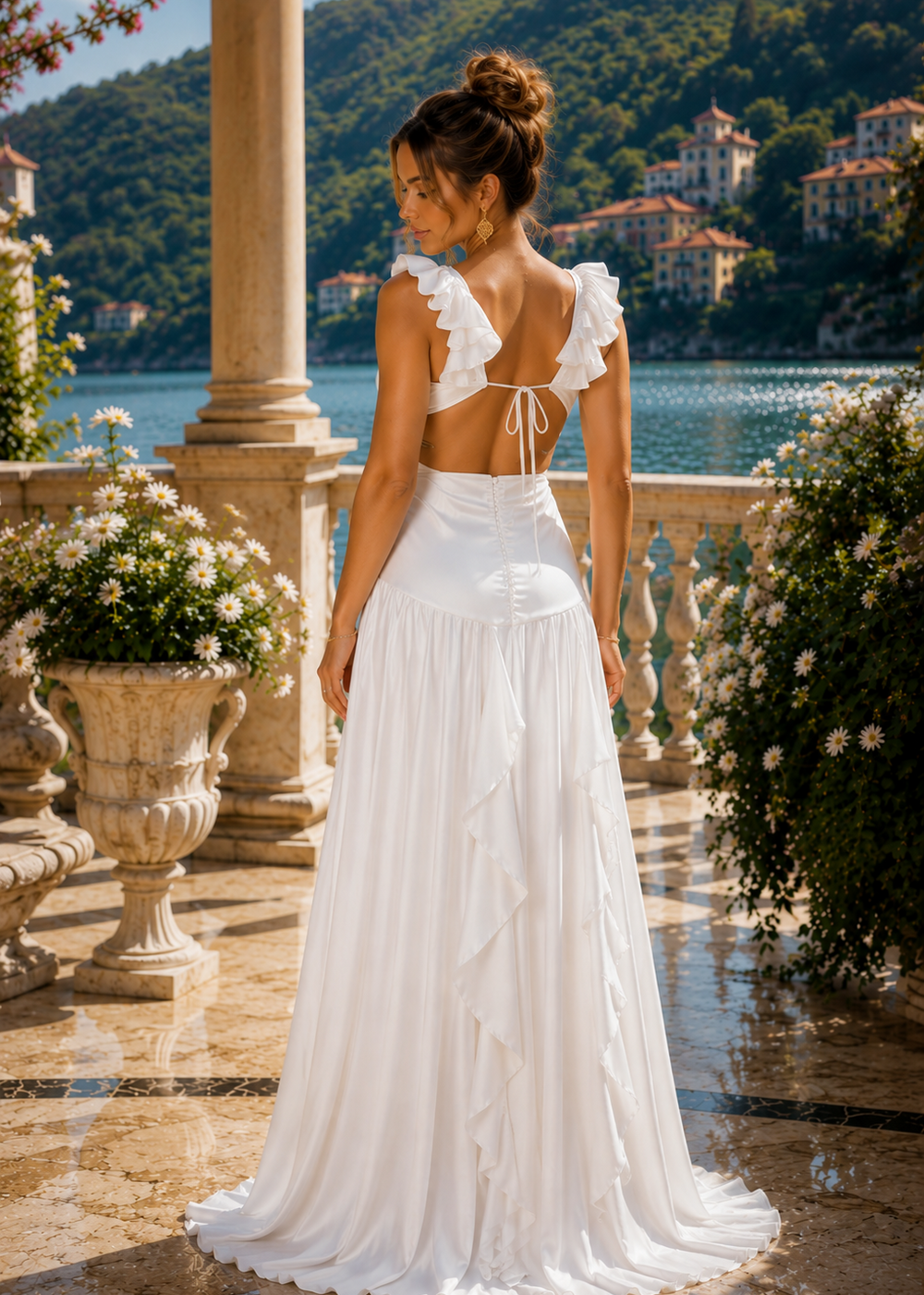 Elegant white satin resort maxi dress with coral ruffle shoulders, deep V neckline and flowing silhouette, perfect for destination weddings, bridal events and luxury vacations.