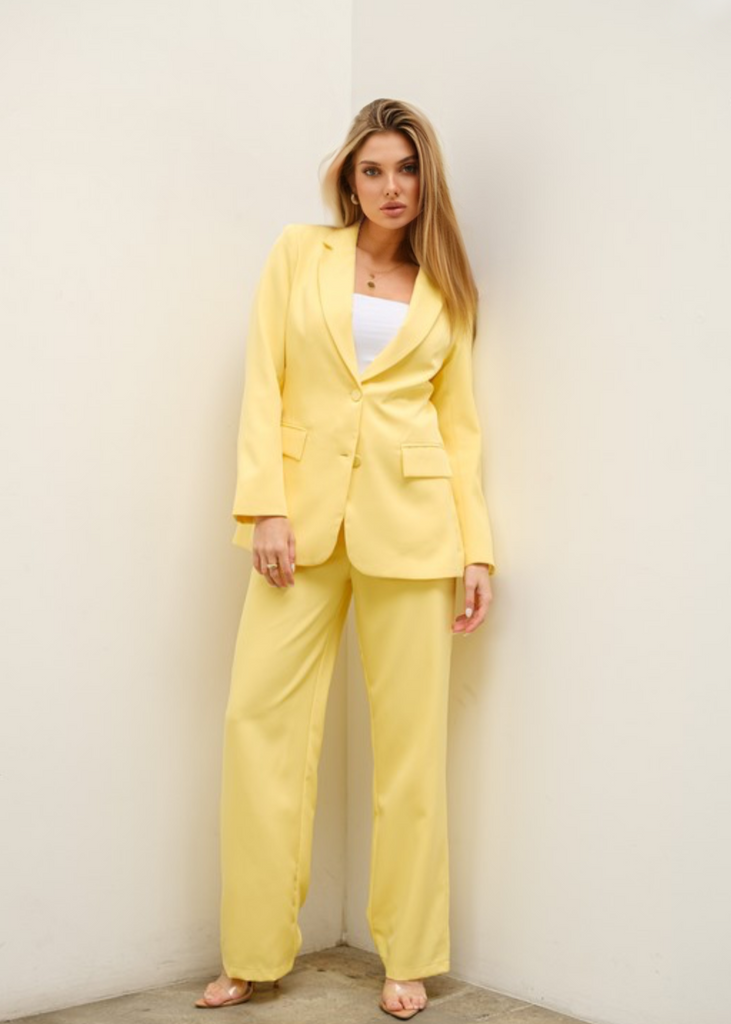 Chic light yellow three-piece blazer suit set designed for stylish women in professional and networking settings